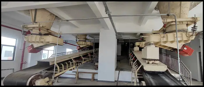 vibrating feeder system for glass production line preventing material blockage ensuring uninterrupted operation