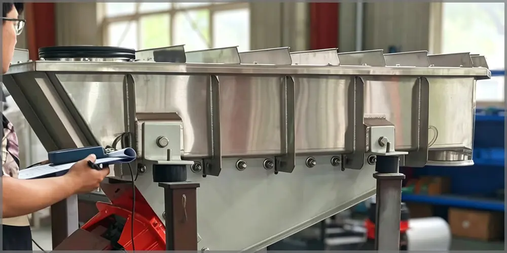 Factory inspection test on stainless steel electromagnetic vibrating feeder for food particle dosing